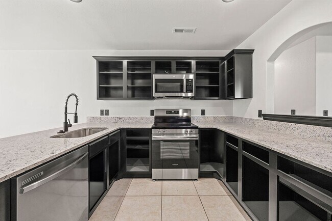 Building Photo - Charming 3-Bed Home in Rogers – Spacious Yard, Modern Comfort, Great Location