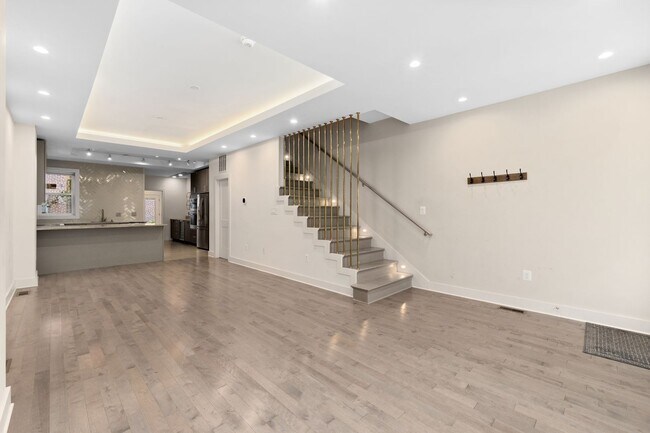 Building Photo - Experience stunning design and modern finishes in Columbia Heights!
