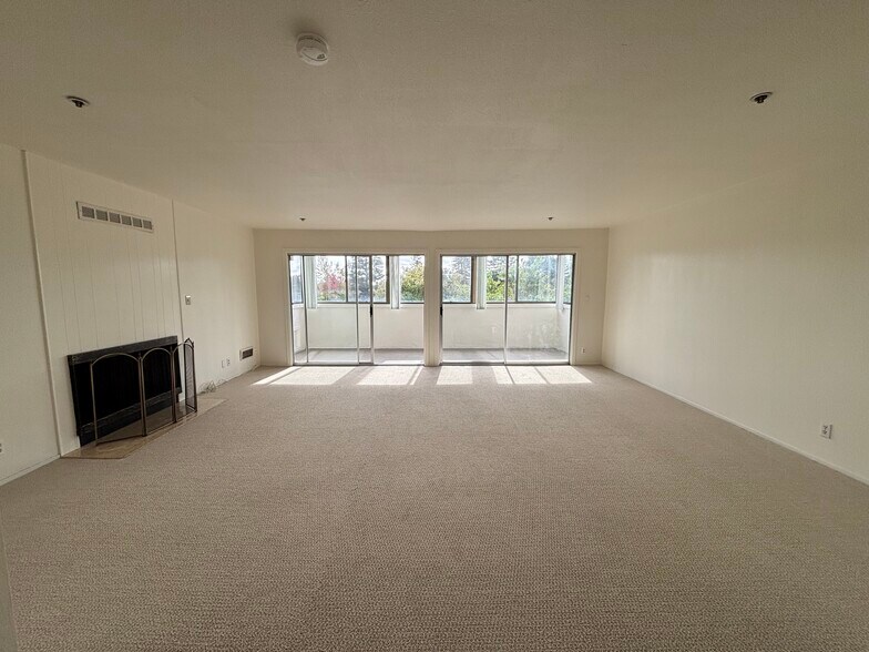 Living room with fireplace - 230 W 5th Ave