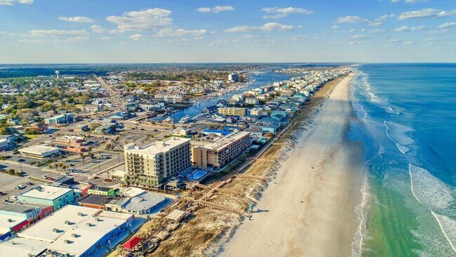 Building Photo - OFF-SEASON FURNISHED MONTHLY RENTAL AVAILABLE NOW