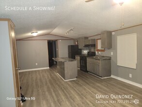 Building Photo - Sale Prices Starting at: $29,999 or Lease ...