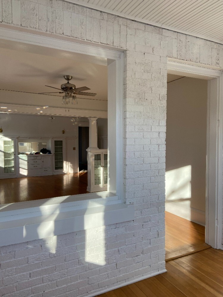 sunroom looking into living and dining rooms - 1517 Portland Ave