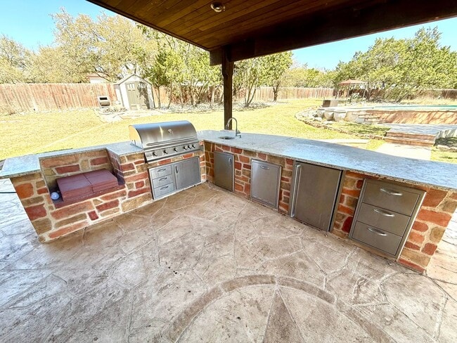 Building Photo - *COMING SOON* Luxurious 2-Story Home in Gated Stone Oak Community – Pool & Lawn Care Included