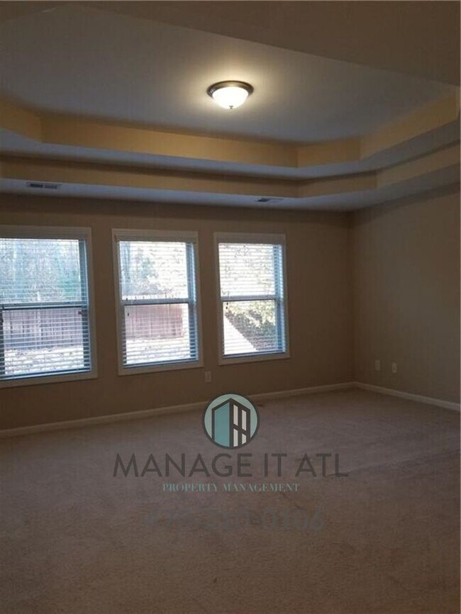 Building Photo - Beautiful 5BR/4BA Home in Just 5 Min from MALL OF GA