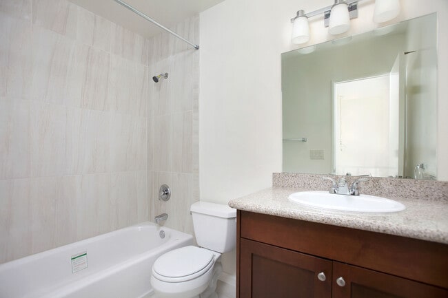 Building Photo - Wonderful Remodeled 2-Story 2BD/1.5BA Townhome in North PB! Parking & Laundry! $4,195/mo