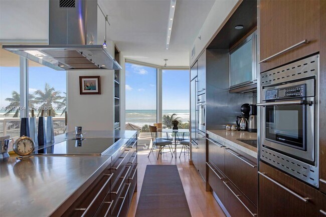 Building Photo - 4779 Collins Ave