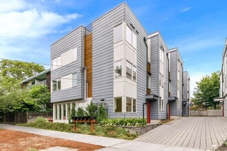 Building Photo - 3 Bedroom Modern Industrial Townhome with City Views & Rooftop Oasis