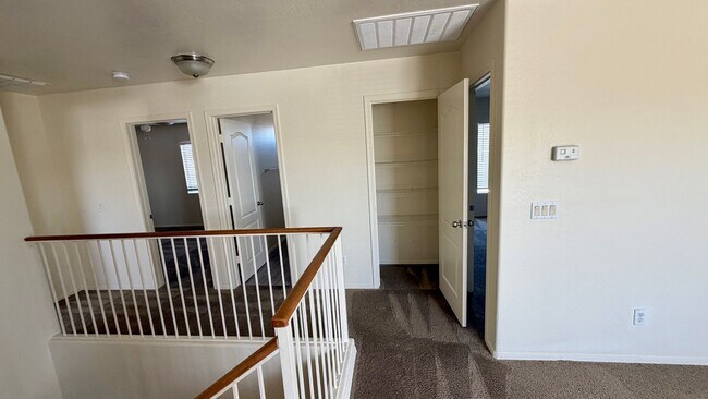 Building Photo - Two Story Home with NEW tile and a large backyard!