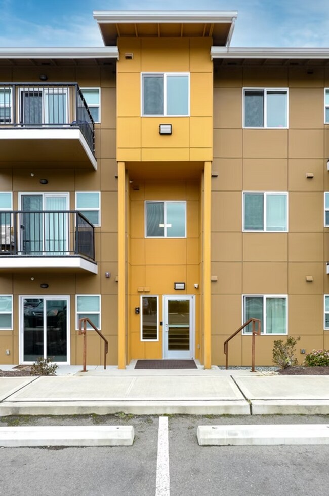 Building Photo - Refined Studio Living at Marigold Apartments — Available Now