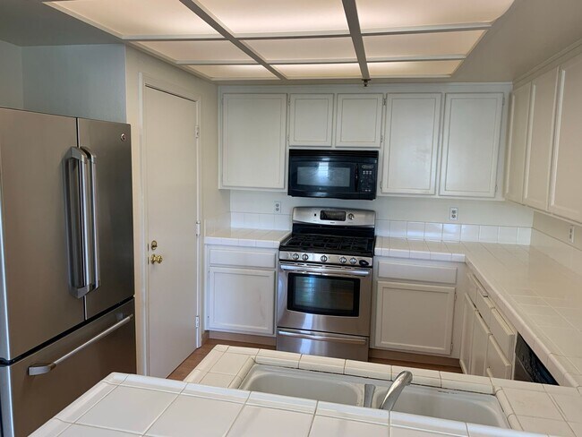 Building Photo - Village in the Park Condo