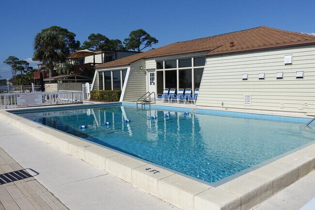 Building Photo - Beautifully remodeled 2 bedroom condo at waterfront complex w/ pool & dock + w/s/g included in th...