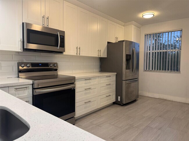 Building Photo - 9055 Wiles Rd