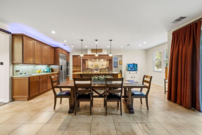 Building Photo - Luxurious 5-Bedroom Pool Home with Solar &...