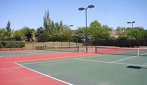 Building Photo - Located in Highland Creek