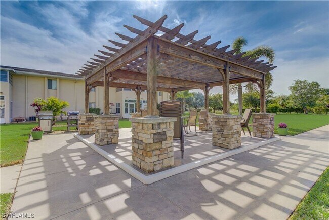 Building Photo - 55+ Charming first-floor condo nestled in the serene Fairways 3 Condominiums