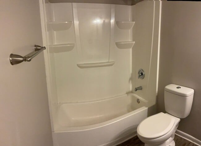 Building Photo - Just off the main road, but in walking dis...