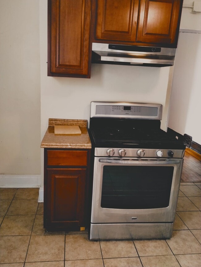 Building Photo - 1120 E 12th Ave