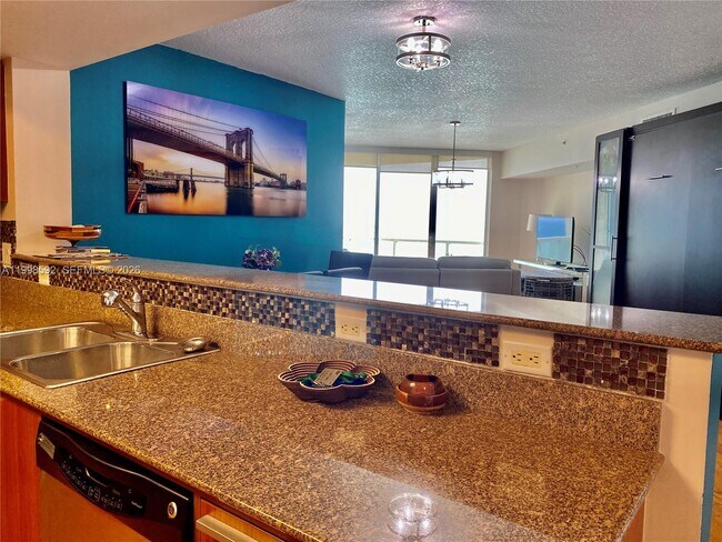 Building Photo - 16699 Collins Ave