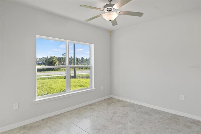 Building Photo - 7035 W Price Blvd