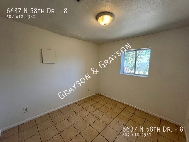 Building Photo - 6637 N 58th Dr