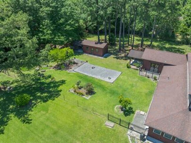 Building Photo - Uniquely breathtaking custom home with in-...