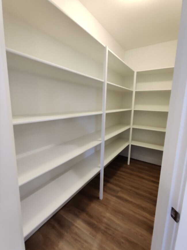 Building Photo - Contemporary Townhome with Open Floor Plan...