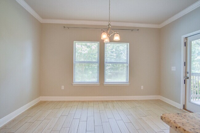 Building Photo - Spacious 4BR Pool Home with Modern Upgrade...