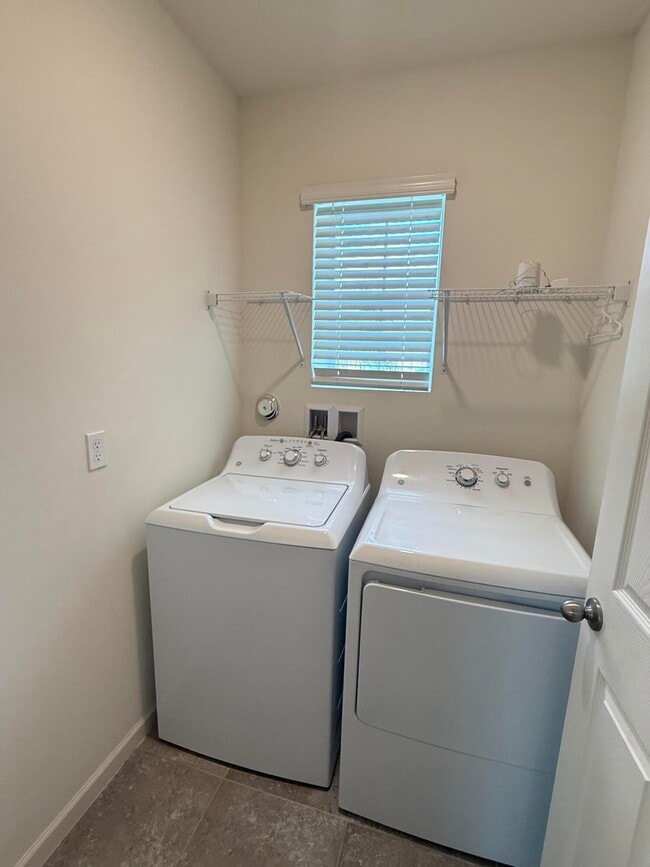 Building Photo - 10997 SW Vasari Way