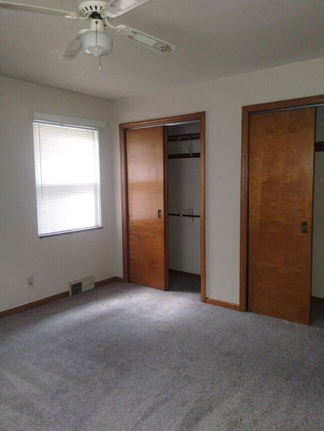 Building Photo - Quaint Duplex with a private Basement, Garage Space & Patio