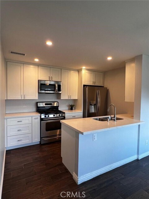 Building Photo - 15225 Santa Gertrudes Ave