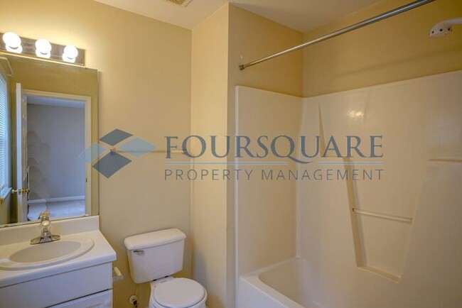 Building Photo - Townhome | 2nd Bedroom Features an En-Suit...