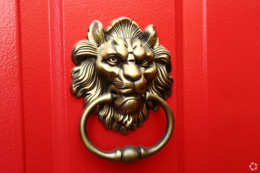 All doors have their own lion knocker! - The Red Lion