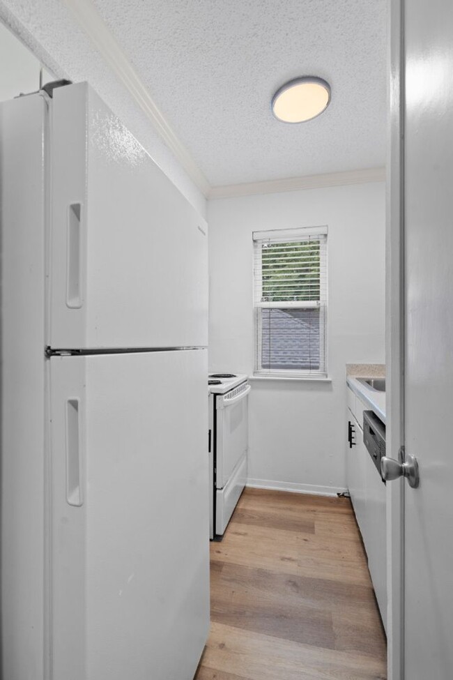 Building Photo - 4105 Speedway, Unit 204