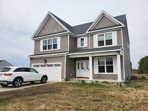 Building Photo - Luxurious 4BR/2.5BA Home with Spacious Living Spaces and Elegant Touches