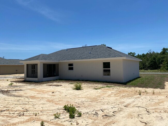 Building Photo - NEW CONSTRUCTION - Desirable SW Ocala Neighborhood 3/2/2 *WON'T LAST*