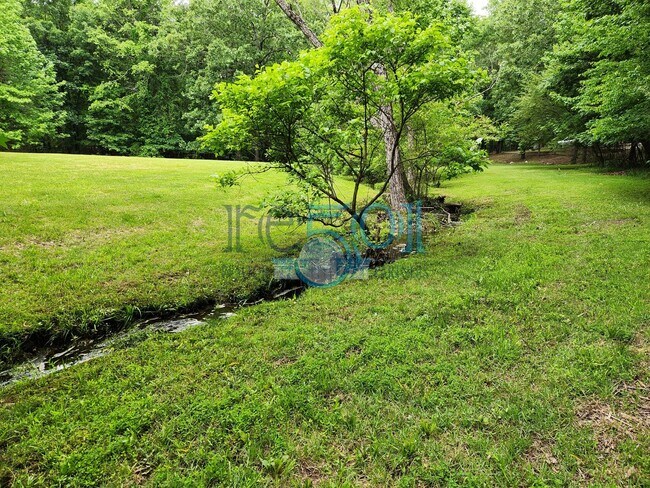 Building Photo - RARE exquisite home on acreage in the heart of West Little Rock!