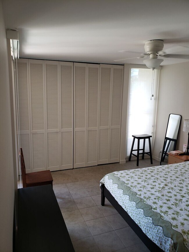 Building Photo - Fully furnished  1 year lease max. , 2 bedroom, 2 bath 2nd floor unit in the Poinciana Manor