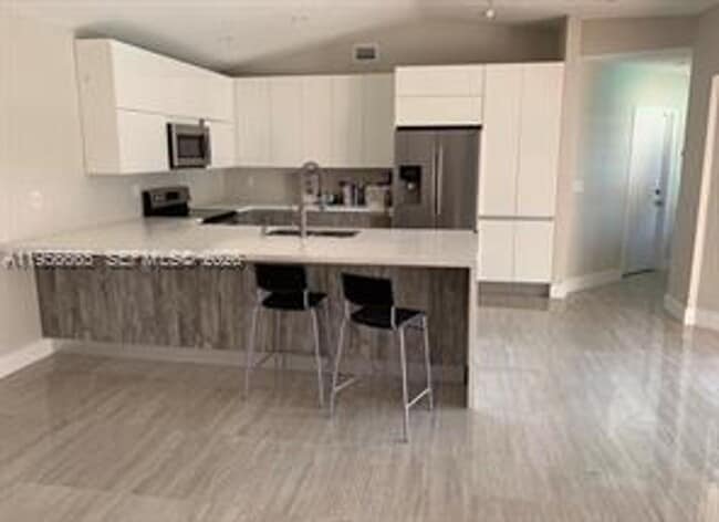 Building Photo - 11320 SW 145th Ave