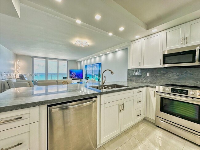 Building Photo - 5701 Collins Ave