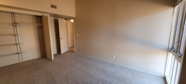 Building Photo - Two-Bedroom Condo| Parking + WiFi Included!