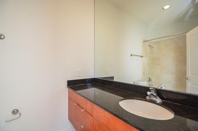 Building Photo - Stylish Corner Townhome Steps from Parks, Dining & Shopping