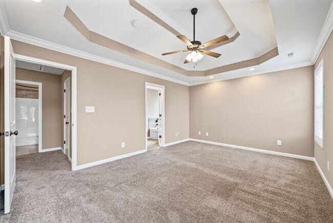 Building Photo - Four Bedroom with Three Car Garage!