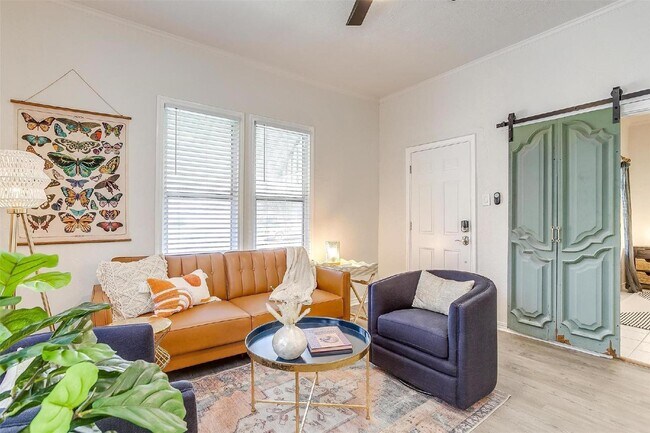 Building Photo - Charming 2-Bed, 2-Bath Gem with Granite Co...