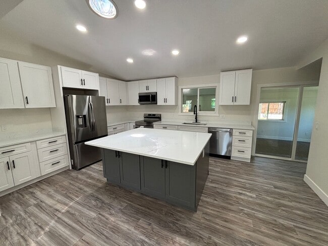 Building Photo - Beautifully Renovated 4-Bedroom Home with Finished Basement