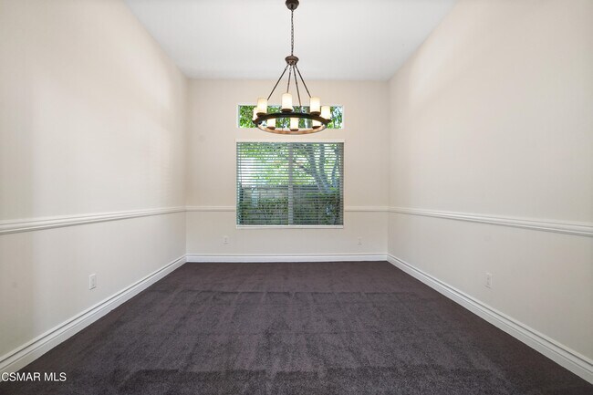 Building Photo - 6077 Mandeville Pl