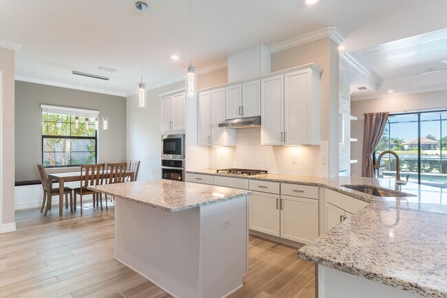 Building Photo - Stunning Country Club East Unfurnished Res...