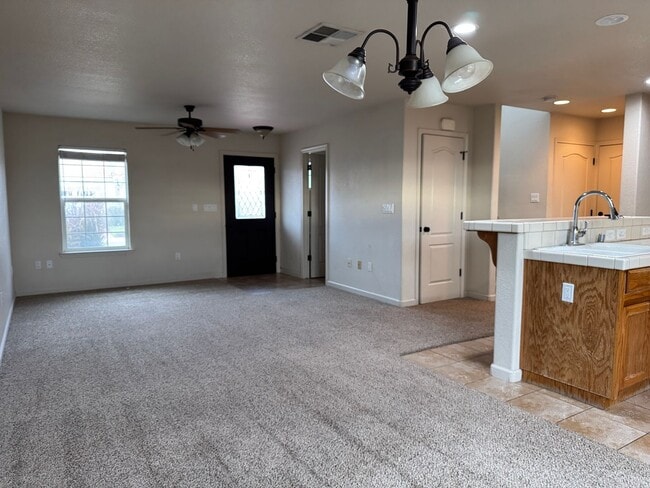 Building Photo - NOW AVAILABLE!! BEAUTIFUL GUSTINE HOME LOCATED IN GATED COMMUNITY