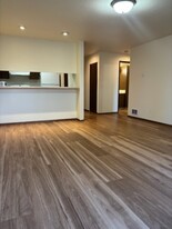 kitchen from living room - Pinehurst Apartments