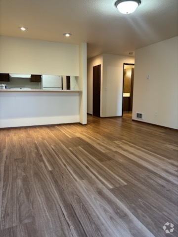 kitchen from living room - Pinehurst Apartments