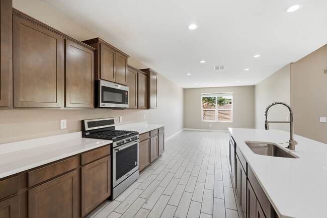 Building Photo - Spacious 5-Bedroom Home with Open Floor Plan & Private Backyard
